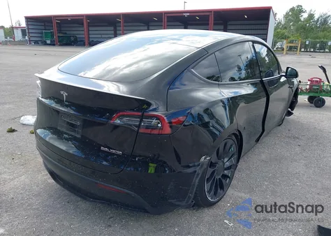 2023 Tesla Model Y Performance Dual Motor All-Wheel Drive z USA, uszkodzony, nr VIN 7SAYGDEF9PF710418